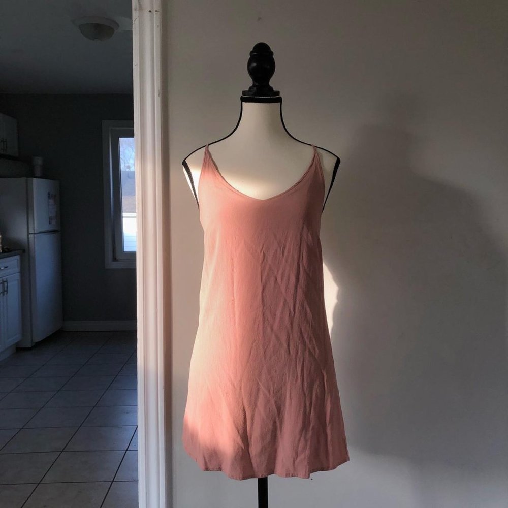 Pink slip-style mini dress